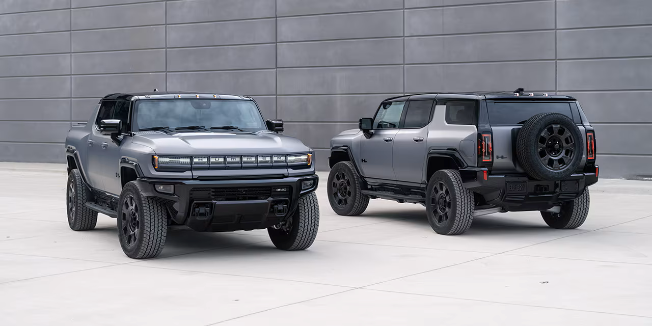 The 2026 GMC HUMMER EV SUV and Pickup parked next to each other