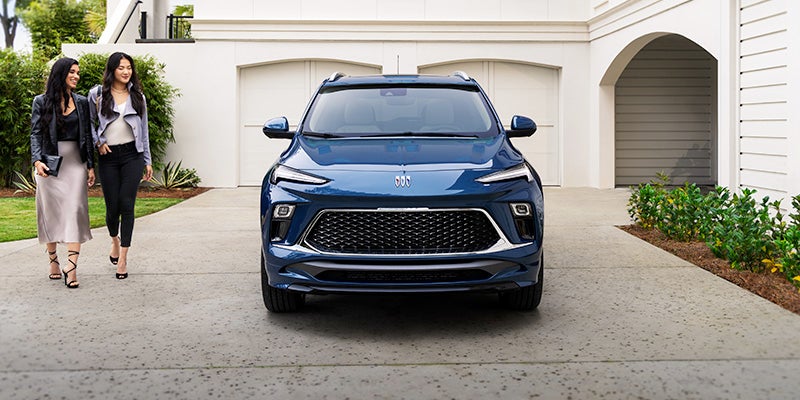 2024 Buick Encore GX with two women walking by