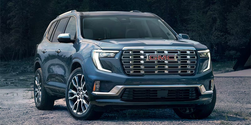 GMC Acadia parked in an open landscape with a bold stance.
