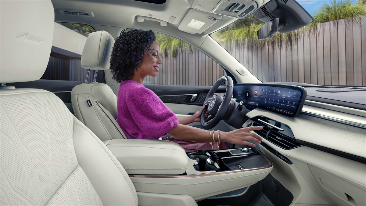 Women in passanger seat of a 2027 Buick Enclave