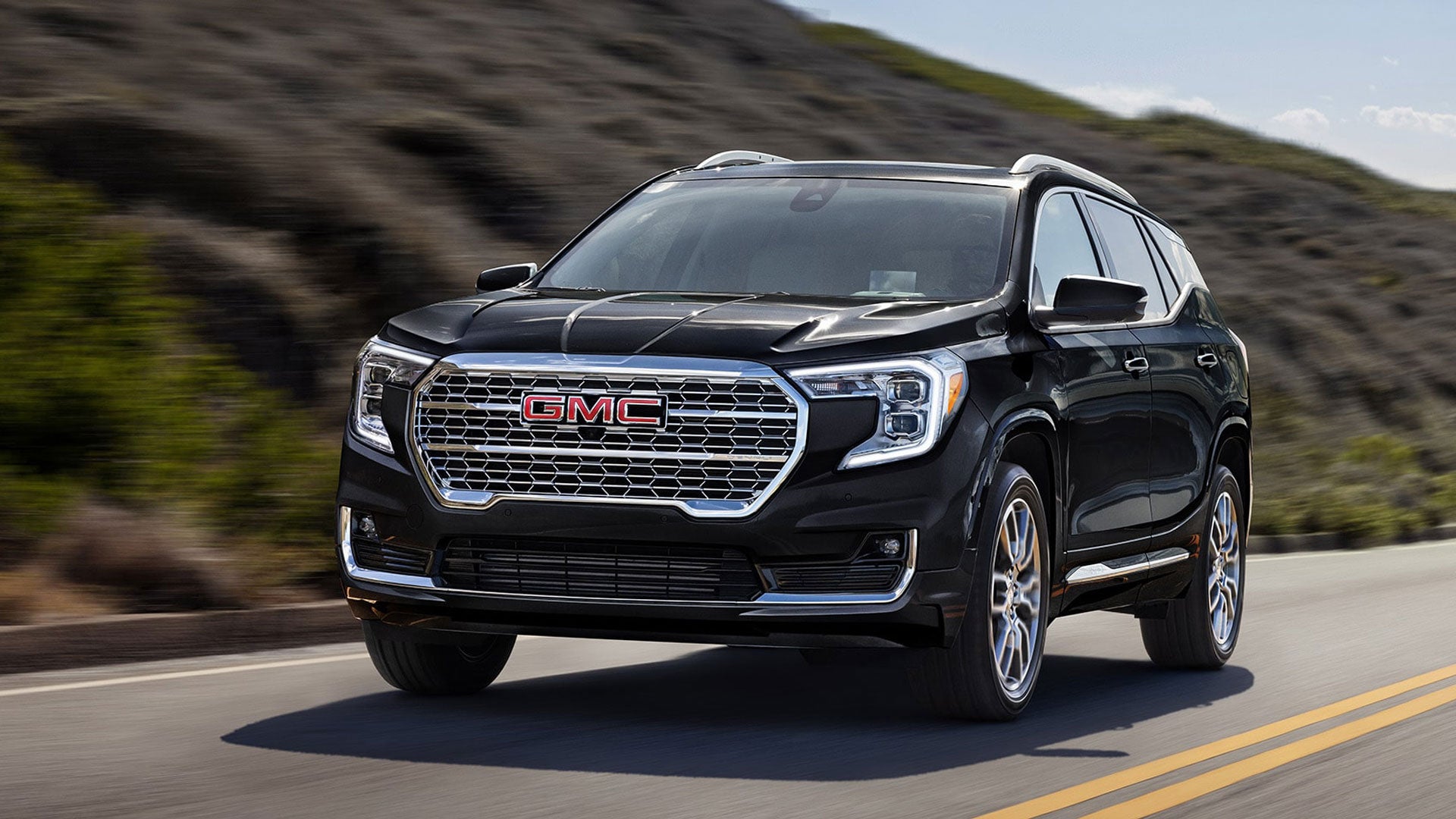The Stunning GMC Terrain in Black Driving On-Road